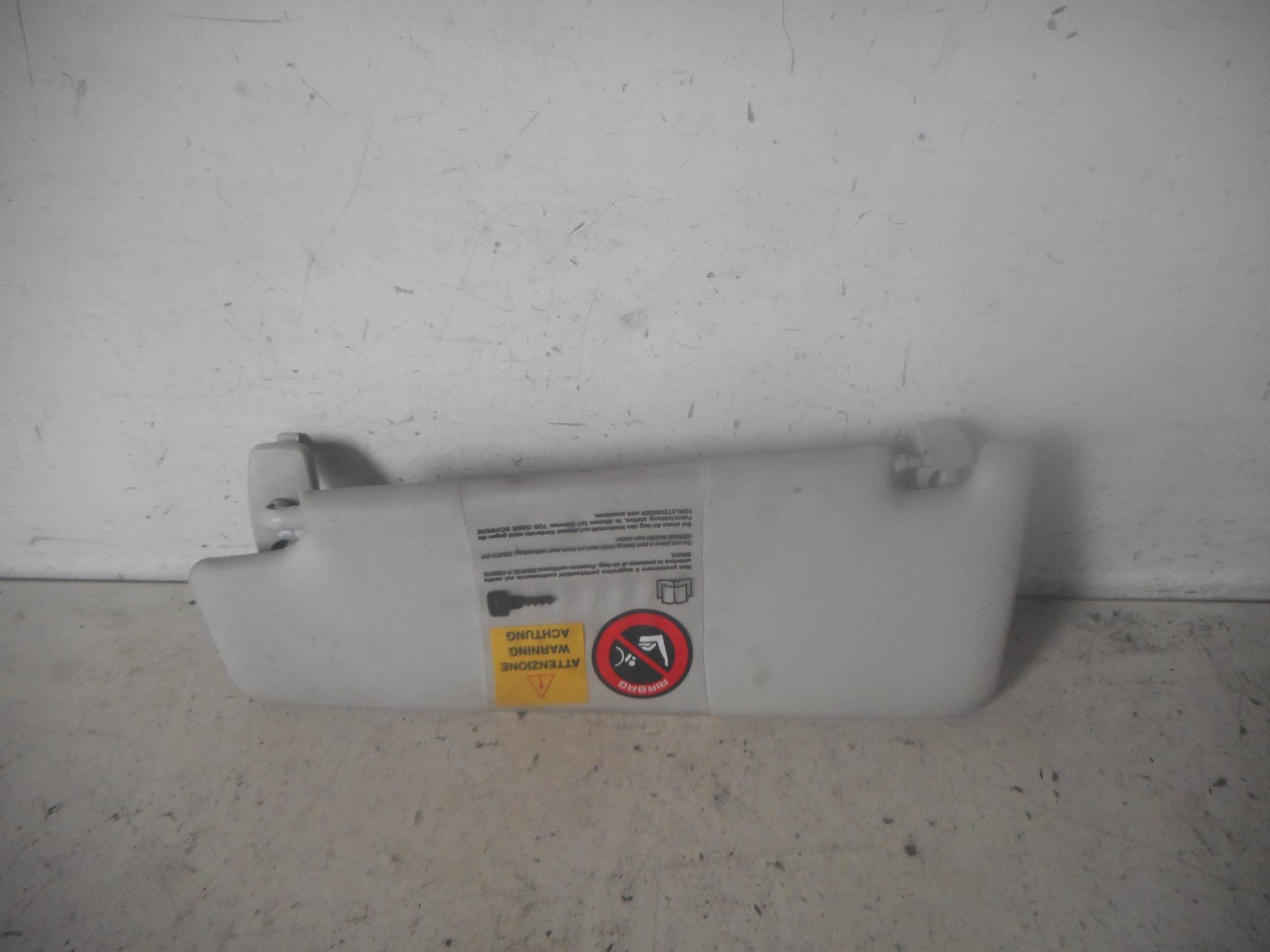 Aletta parasole parabrezza dx.